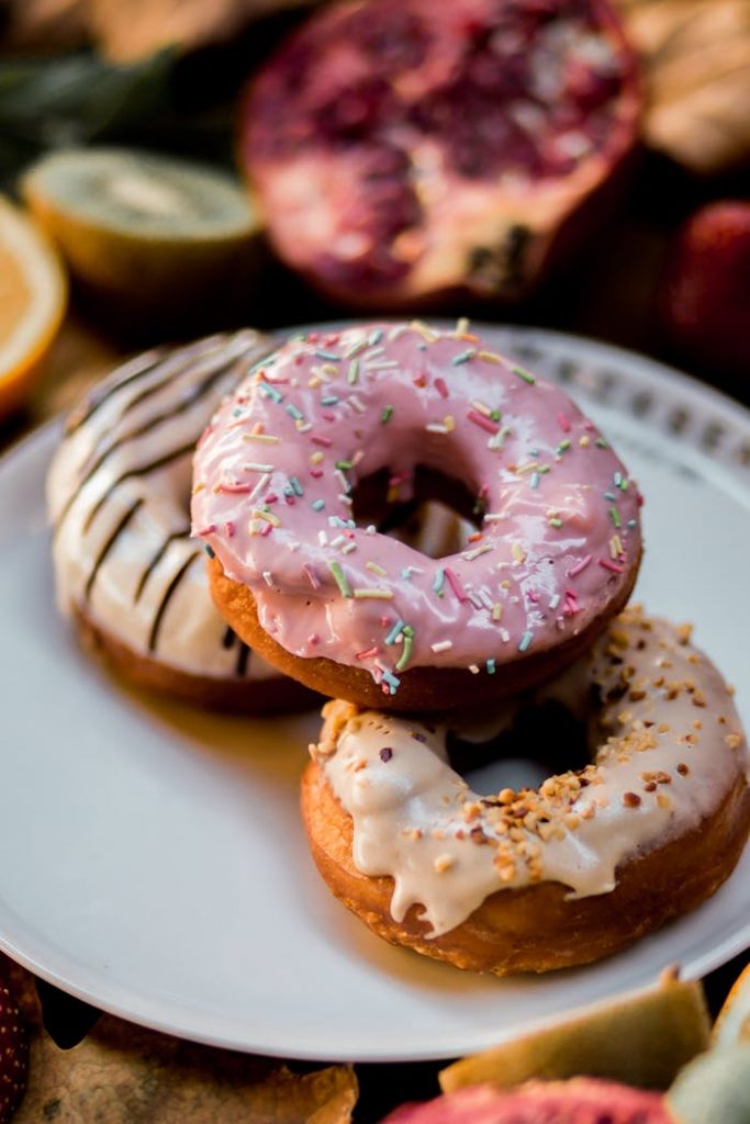 Mastering the First Impression: Your intriguing post title goes here A mouthwatering trio of donuts with various toppings, perfect for sweet cravings.